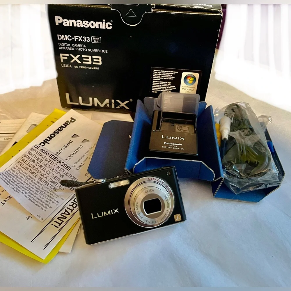 NIB! Leica Lens Panasonic Lumix FX33 DMC Silver Black Digital Camera